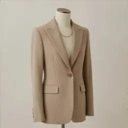 A classic beige trench coat over any outfit—jeans, dresses, or suits—adds instant sophistication. Belt it or leave open for a relaxed look.