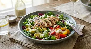 Transform last night’s grilled chicken into a breakfast salad with avocado, mixed greens, and a light vinaigrette—no cooking required.