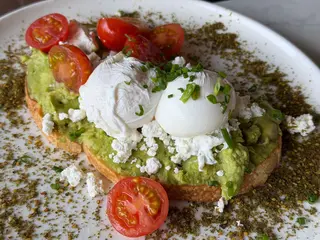 A warm bowl of seasoned lentils topped with a poached egg and crumbled feta provides fiber, protein, and comfort in one dish.