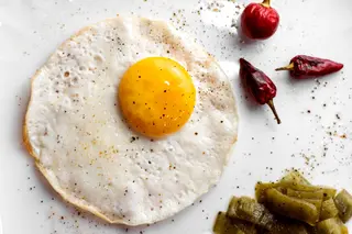 Spread mashed edamame on whole-grain toast and crown it with a fried egg for a plant-forward, high-protein twist on toast.