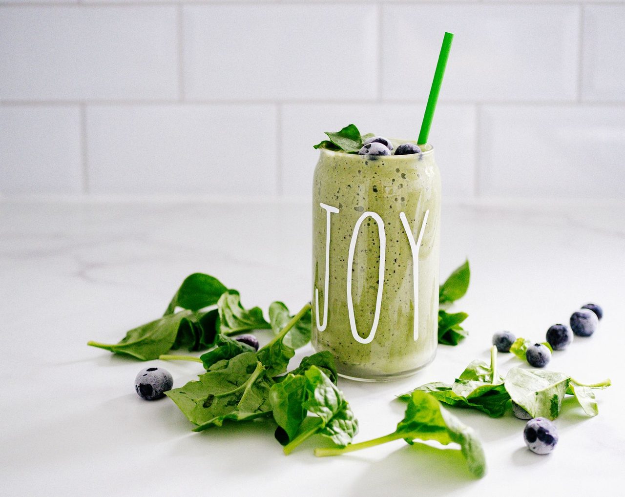 Blend a thick smoothie with frozen banana, a scoop of protein powder, and a spoonful of almond butter for a portable, filling meal.