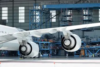 The aircraft was grounded for inspection. Mechanics examined the engines and systems thoroughly.