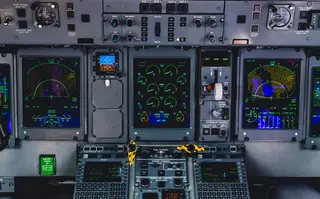 Suddenly, alerts sounded in the cockpit. The captain announced an issue and that they would be turning back.
