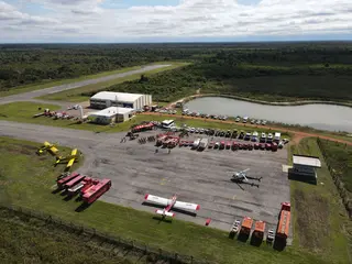 Pilots began descent toward Kahului Airport. Fire trucks and emergency vehicles lined the runway.